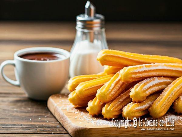 Churros caseros dorados y crujientes espolvoreados con azúcar.